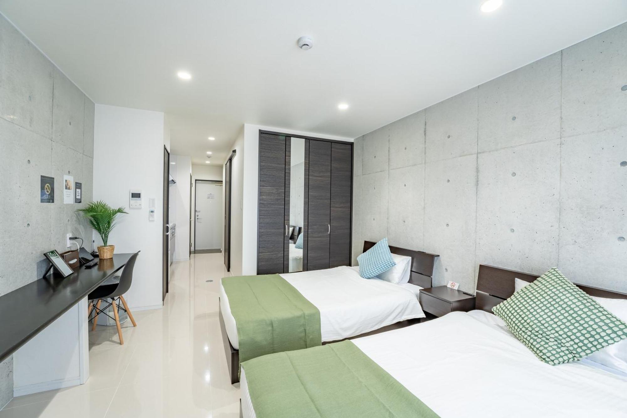 Hotel Paradiso Miyakojima Habitación foto